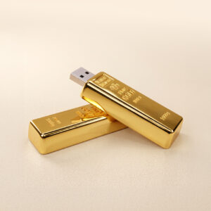 usb-minne i form av guldtacka